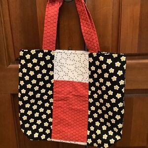 Tote bag with an extra bag for storage